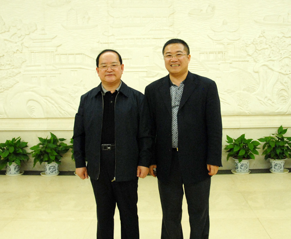 1569823682599716.jpg 13.原江西省委書記、現廣西壯族自治區黨委書記鹿心社與正邦集團總裁林印孫親切合影.JPG